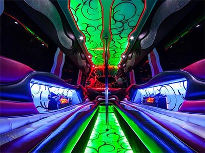 The interior of a lit-up party bus