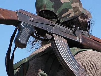 A close up of someone carrying a gun