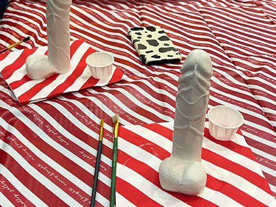 Two plain clay willies about to be decorated at a willy workshop