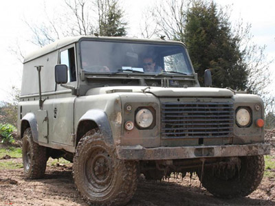 A big 4x4 car with a driver who is driving blindfolded at Blind 4 x 4 Driving and Clays by Max Events