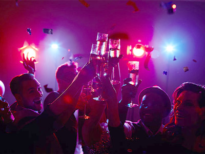 A cocktail bar under disco lights
