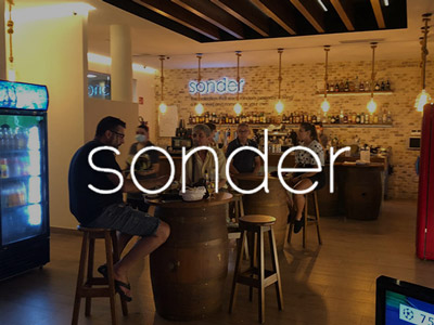 People sat at tables and having a drink at Sonder in Benidorm