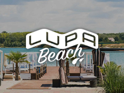 The sea front with sun loungers and beds at Lupa Beach Club in Budapest