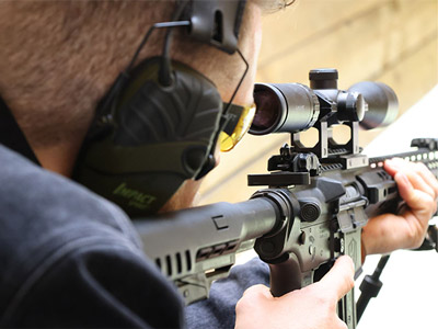 Someone looking down a gun ready to aim at shooting with Hover Force Ltd