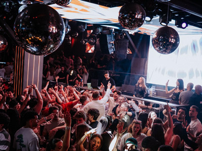 A group of friends drinking in a club in Lisbon