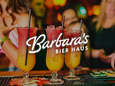 Three cocktails on the bar at Barbara's Bier Haus