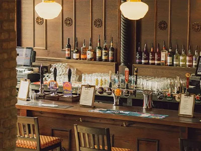The bar at the Crooked Crown which looks very traditional and has wooden panelling 