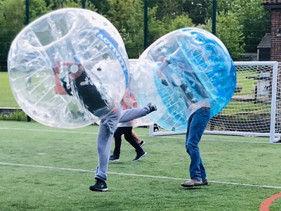 People at bubble football in Porto