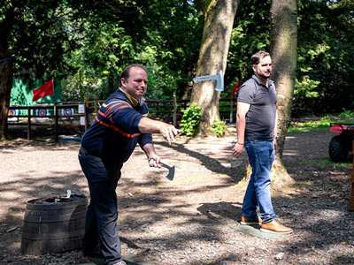 Someone throwing an axe at a target in Edinburgh