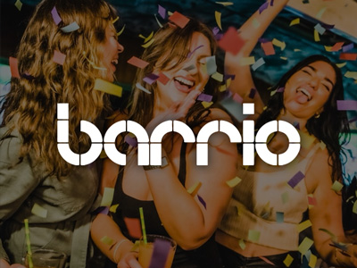 Girls partying with the Barrio logo overlaid