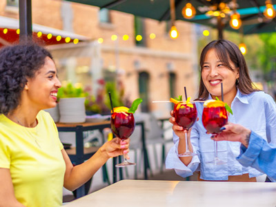 A few friends enjoying a glass of sangria