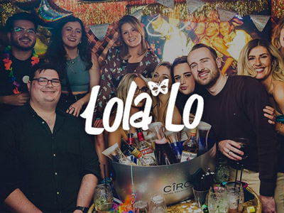 A group of stag and hens enjoying a premium VIP area with different drinks at at Lola Lo in Bristol