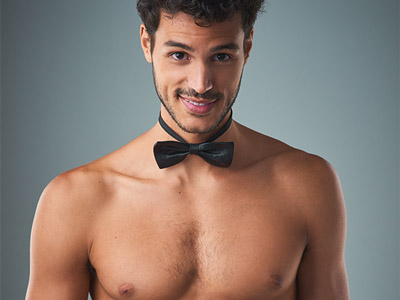 A topless cheeky butler wearing a bowtie