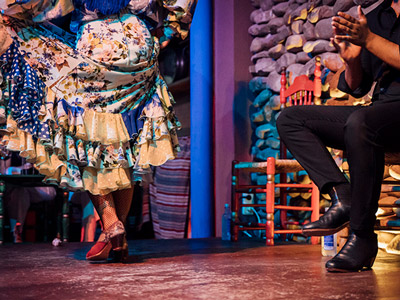 A close up of people dancing at a Flamenco Dinner and Show in Benalmadena
