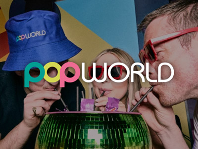 Three people wearing sunglasses and all drinking from the same sharing cocktail with the popworld logo layed over it 