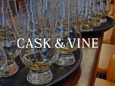 A selection of empty whisky glasses with the words 