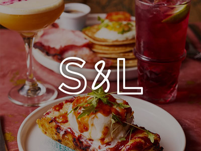 A brunch dish and a couple of cocktails with the Slug & Lettuce logo layered over it 