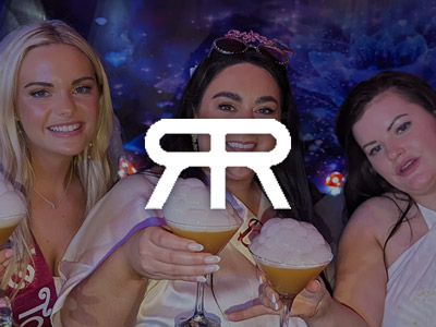 Three women on a hen do drinking cocktails with the River Rooms logo layed over it 