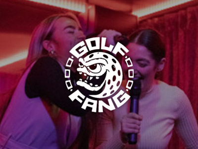 Two women singing into microphones in a karaoke booth with the Golf Fang logo layered over it 