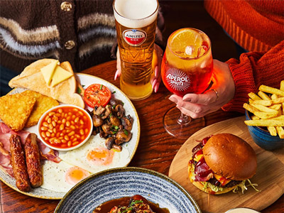 A selection of brunch dishes including full English, a burger and some drinks 