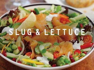 A top-down view of two large plates of food