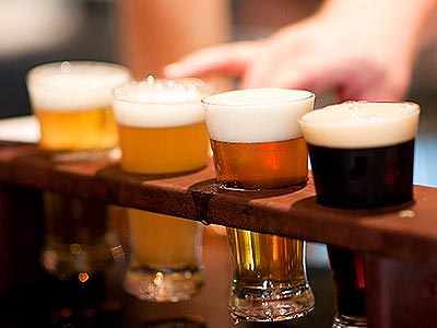 Close up of four craft beers in a rack - Rank #4