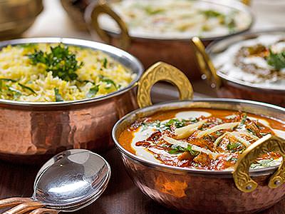 Curry dishes in rose gold bowls