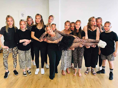 A group of hens dressed in leopard print at a Single Ladies Dance Class