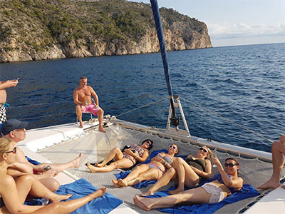 Lots of people on a private catamaran charter in Magaluf