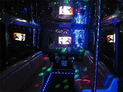 Interior of a party bus lit-up with lights