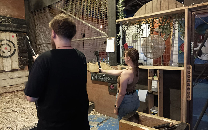 Some of our staff practising how to throw axes