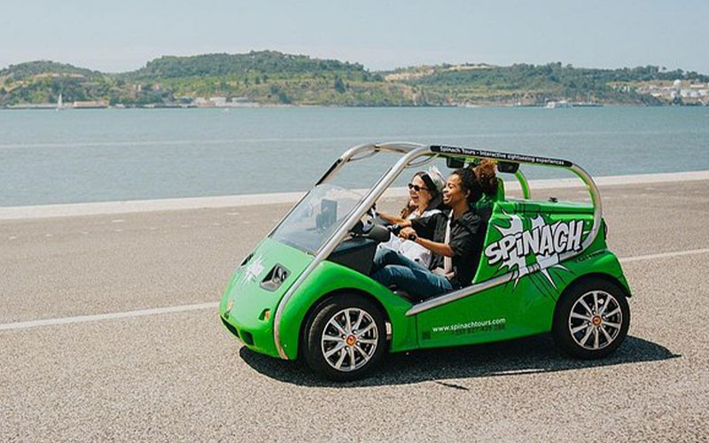 Tour Lisbon in these lovely little green cars 