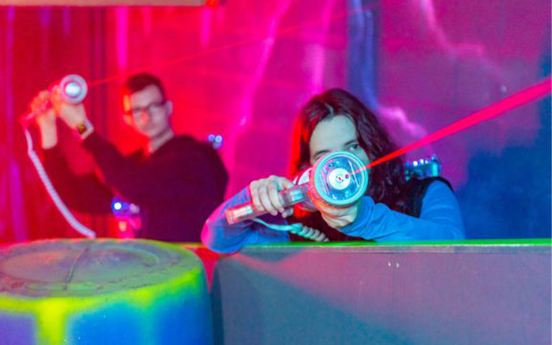 Play 2 games of laser quest 