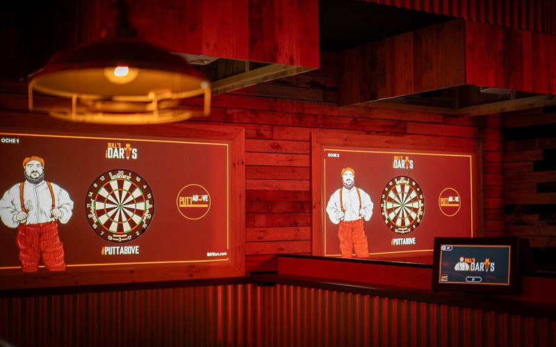 The darts board adds up the scores for you 