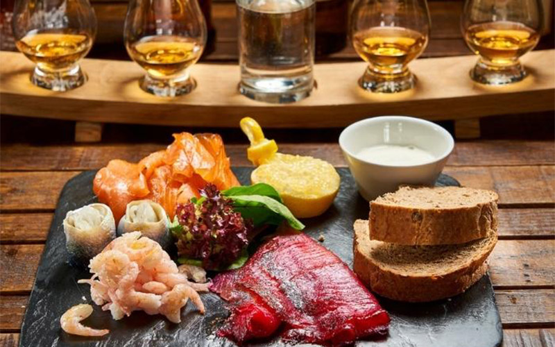 Your whisky will come with tasty canapés