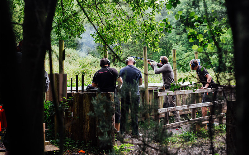 The activity takes place in a picturesque forest 