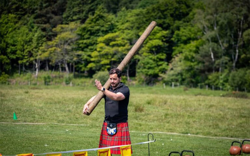 Learn how to toss the caber 