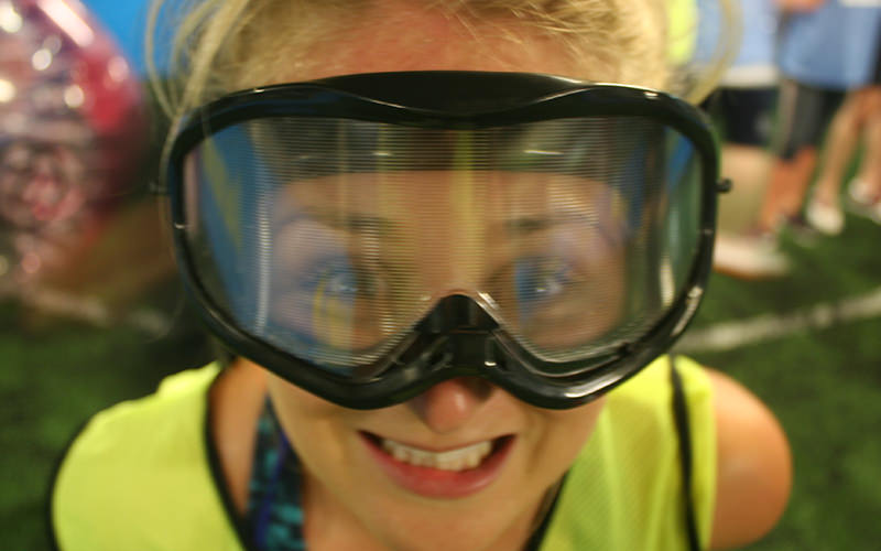 A woman wearing large goggles