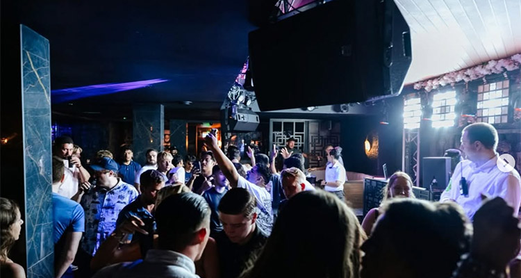 A group of party goers dancing at Lost in Bournemouth 