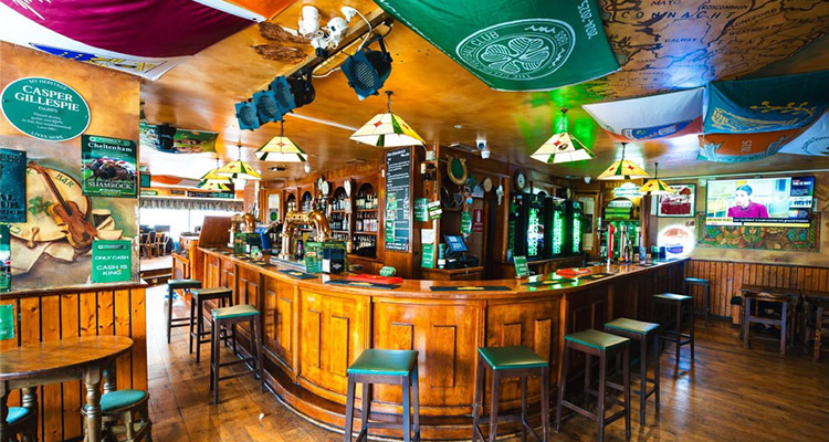 The interior of Shamrock Pub which has Irish-themed decor 