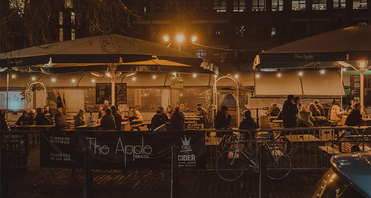 The beer garden at The Apple at nighttime 