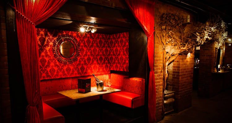 A booth area in Madame Koo, Newcastle