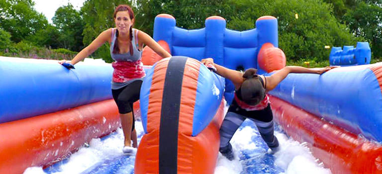 Some girls taking part in Water Wipeout