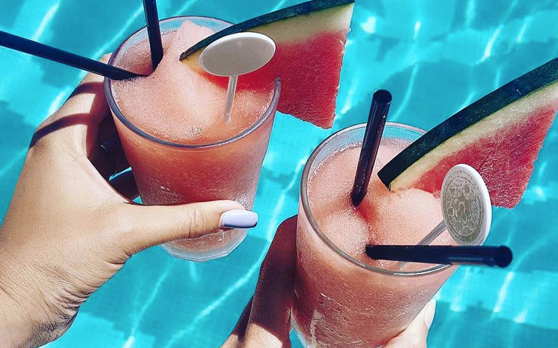 Two cocktails with watermelon in