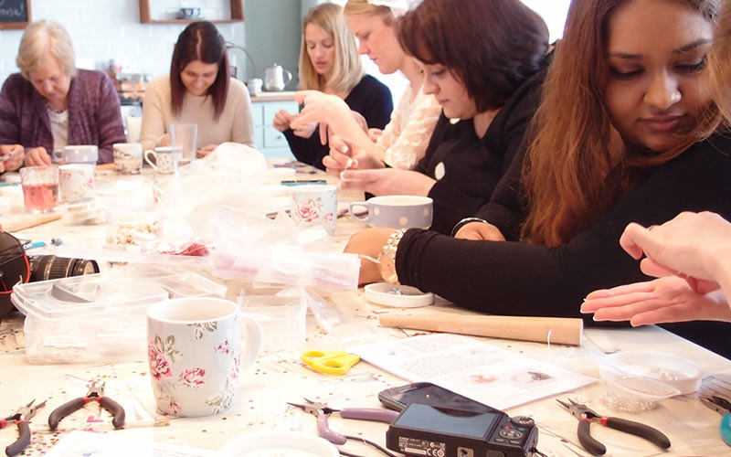 Some women doing a craft class