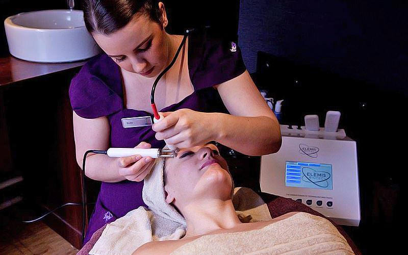 A girl receiving a facial