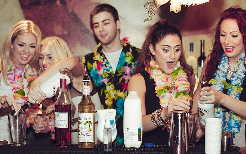 A hen group enjoying a cocktail making class
