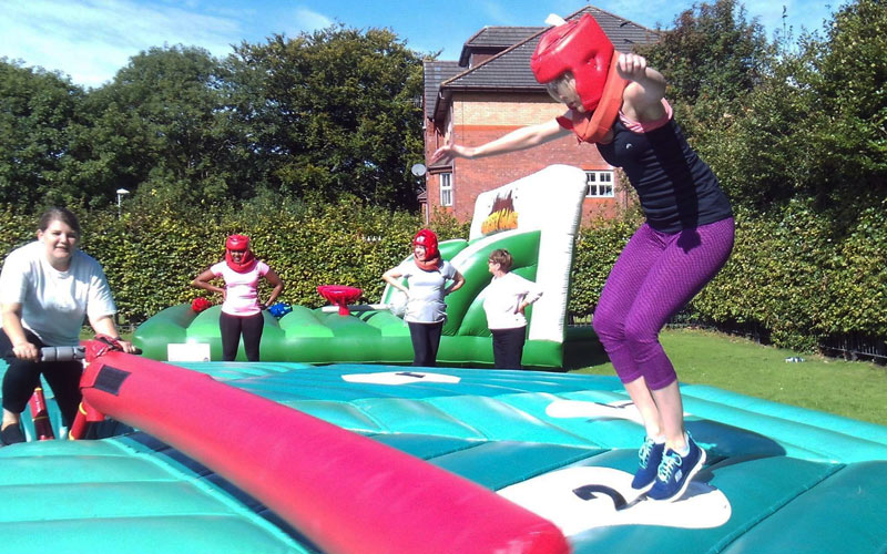 A girl on an inflatable obstacle