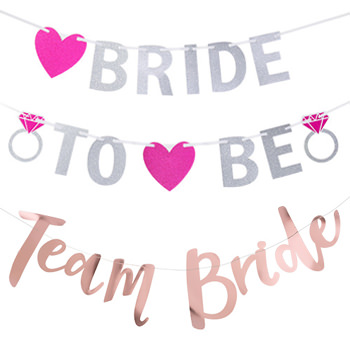 A silver and pink bride to be banner and a rose gold team bride banner.