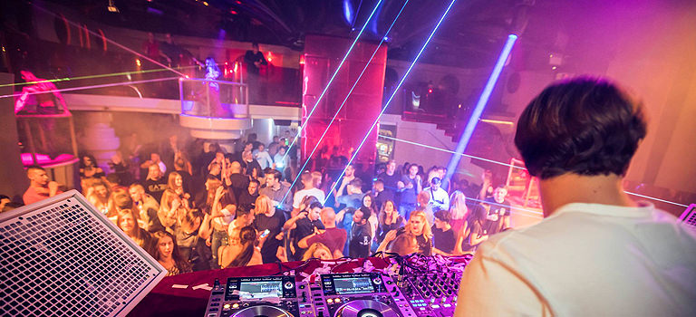A DJ in a nightclub